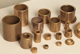 Бронзовые втулки скольжения: какие особенности у спеченных комплектующих?